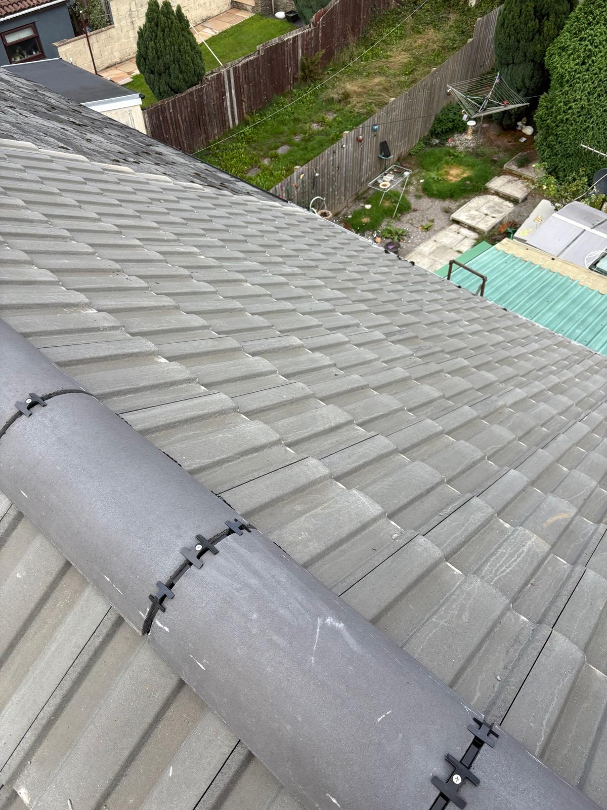 New grey interlocking tiled roof with dry-fix ridge completed in a day in Cwm, Ebbw Vale
